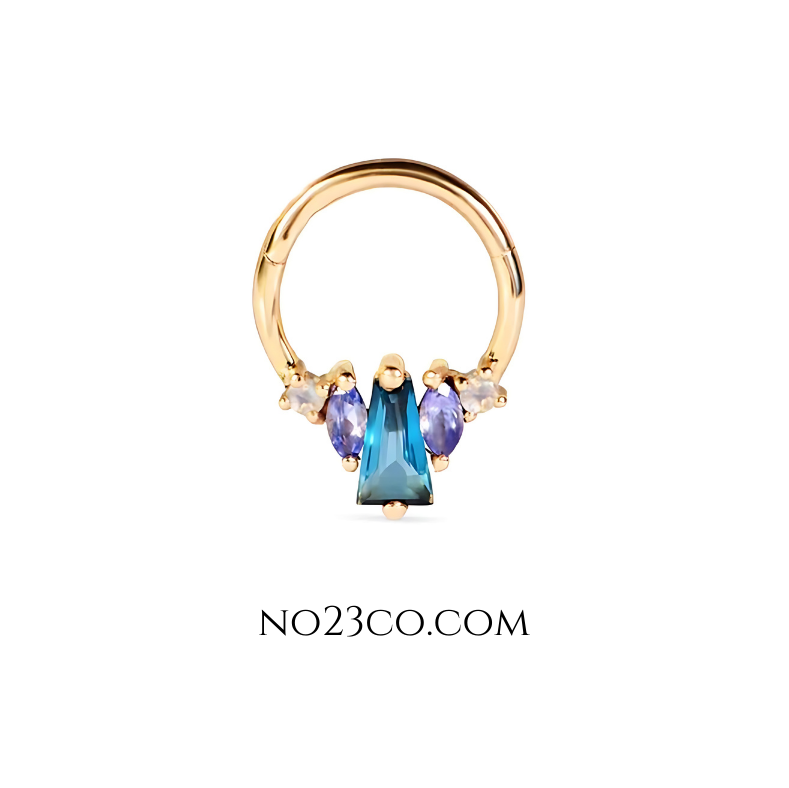Stylish septum daith ring piercing jewelry featuring vibrant blue and purple accents.