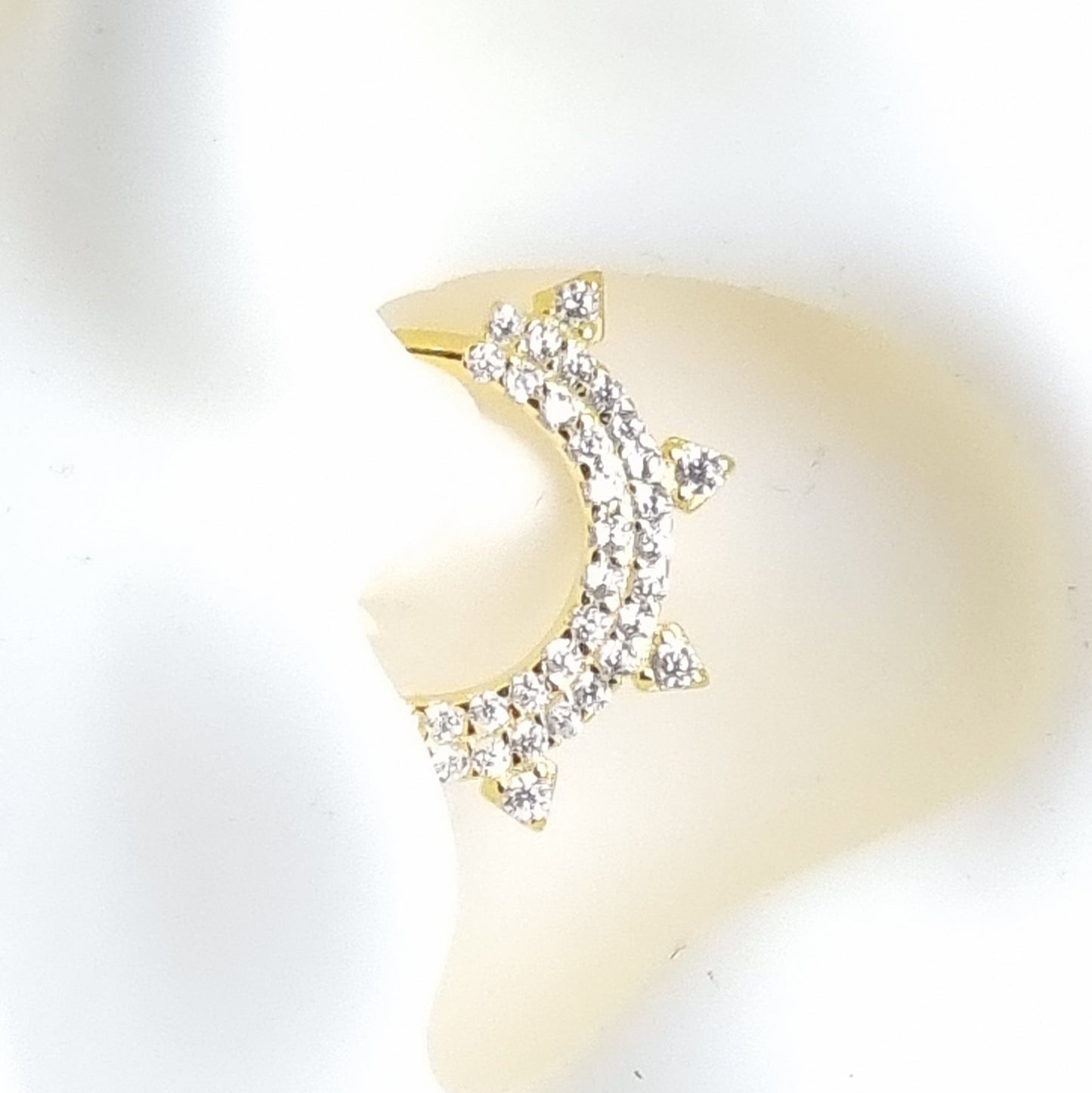 Sophisticated 18K gold plated daith ring crafted in 925 sterling silver for a luxe, polished look.