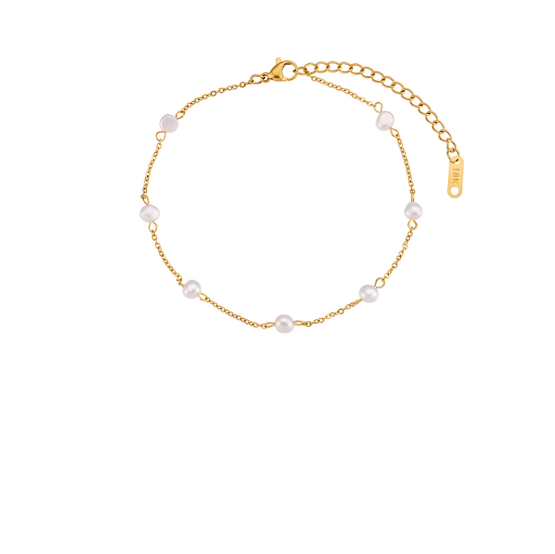 Elegant anklet bracelet featuring seven luminous freshwater pearls and 18K gold-plated PVD stainless steel, designed to be stylish and tarnish-resistant