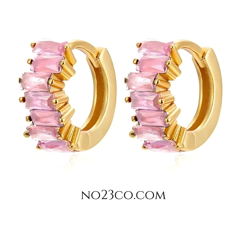 Pink cubic zirconia huggie earrings in 18K gold-plated 925 sterling silver, featuring rectangular-cut stones and a sleek, modern hoop design.