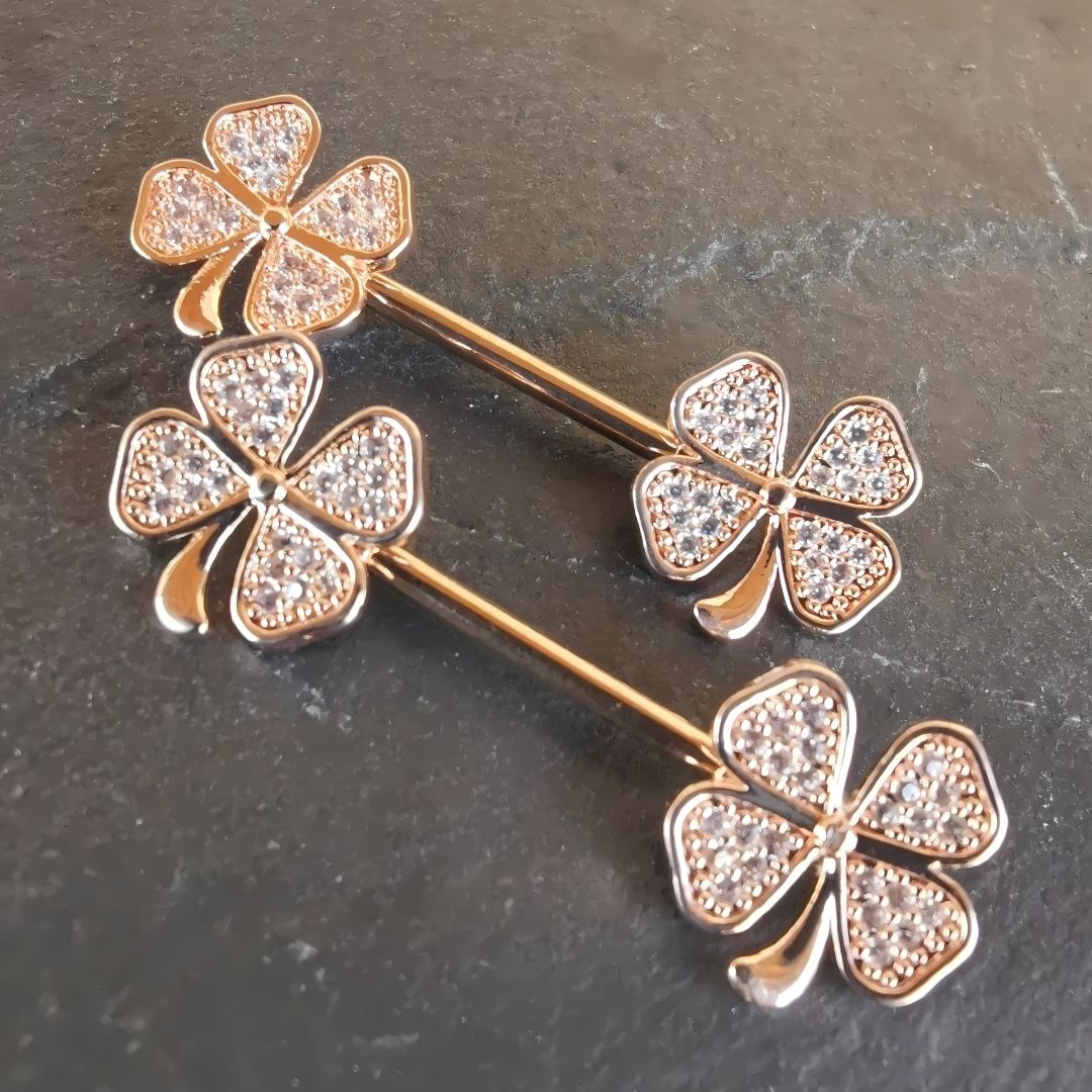 Clover leaf rose gold nipple piercing bar with cubic zirconia, crafted from 14G surgical steel 316L