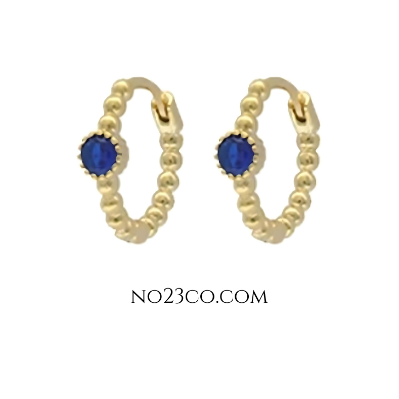 Front view of blue zirconia tiny hoop ear piercing pair with 18k gold-plated sterling silver 925 finish showcasing a sleek design.