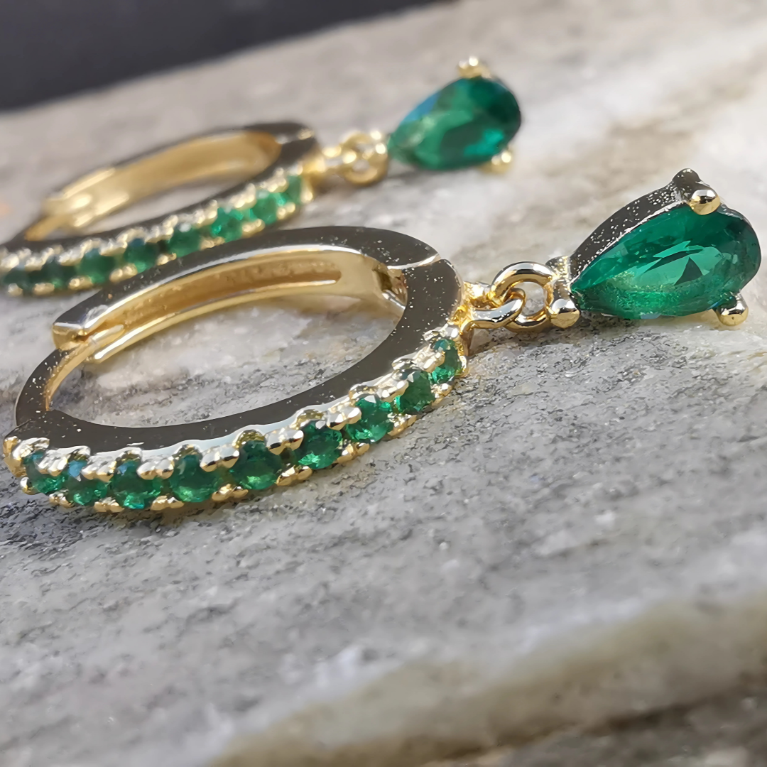 Elegant green zirconia droplet ear piercing pair crafted in 18K gold plated 925 sterling silver.