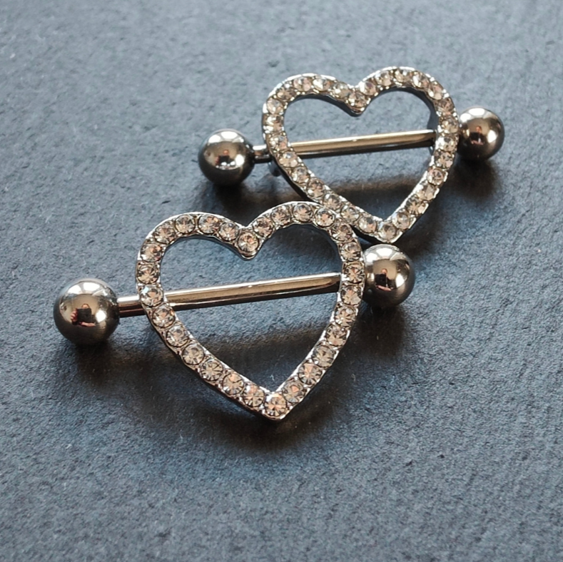 Heart nipple piercing shield bars in 14G surgical steel 316L, featuring a sleek silver finish