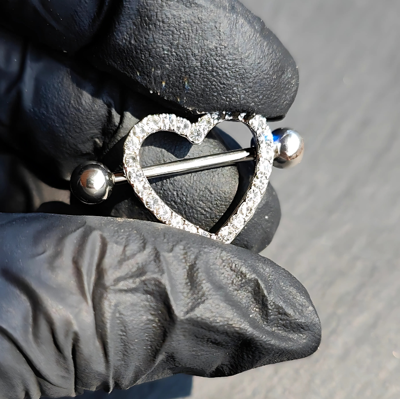 Heart Shield nipple barbell in polished 316L silver surgical steel, 14G, featuring a heart-shaped shield accent.