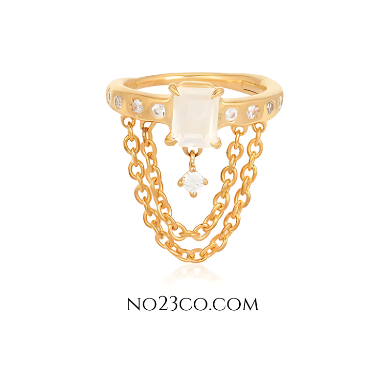 Front view of helix hook ear piercing with chains and zirconia accents in gold and sterling silver, showcasing a modern design.