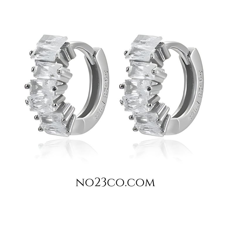 White 5A cubic zirconia huggie earrings in 925 sterling silver, featuring rectangular-cut high-grade stones with a minimalist polished hoop design.