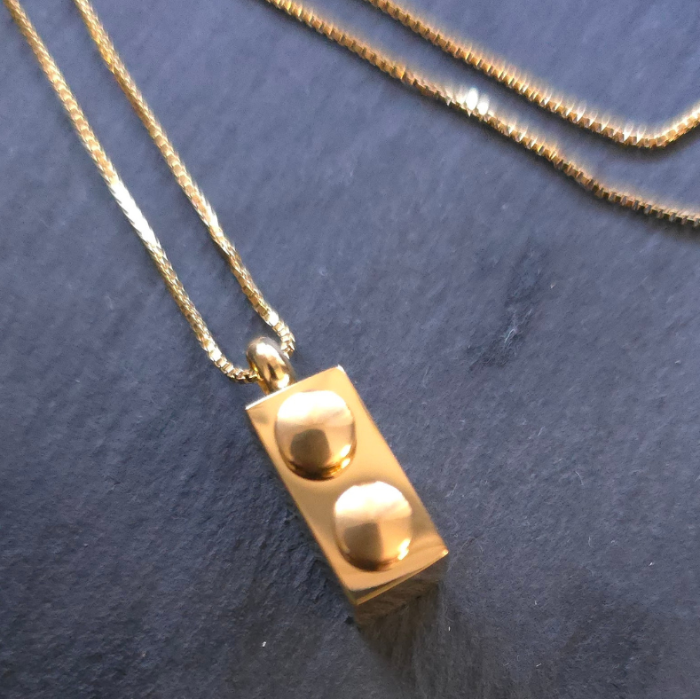 18K Gold PVD Plated Stainless Steel Lego Necklace – A trendy and durable rectangle brick pendant necklace with a lustrous gold finish. Waterproof, sweatproof, and designed for long-lasting shine and style