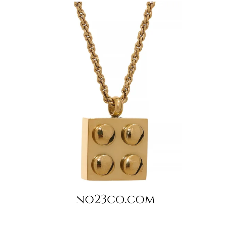 Stylish square brick necklace with a Lego-inspired design, made from waterproof 18K gold PVD plated stainless steel.