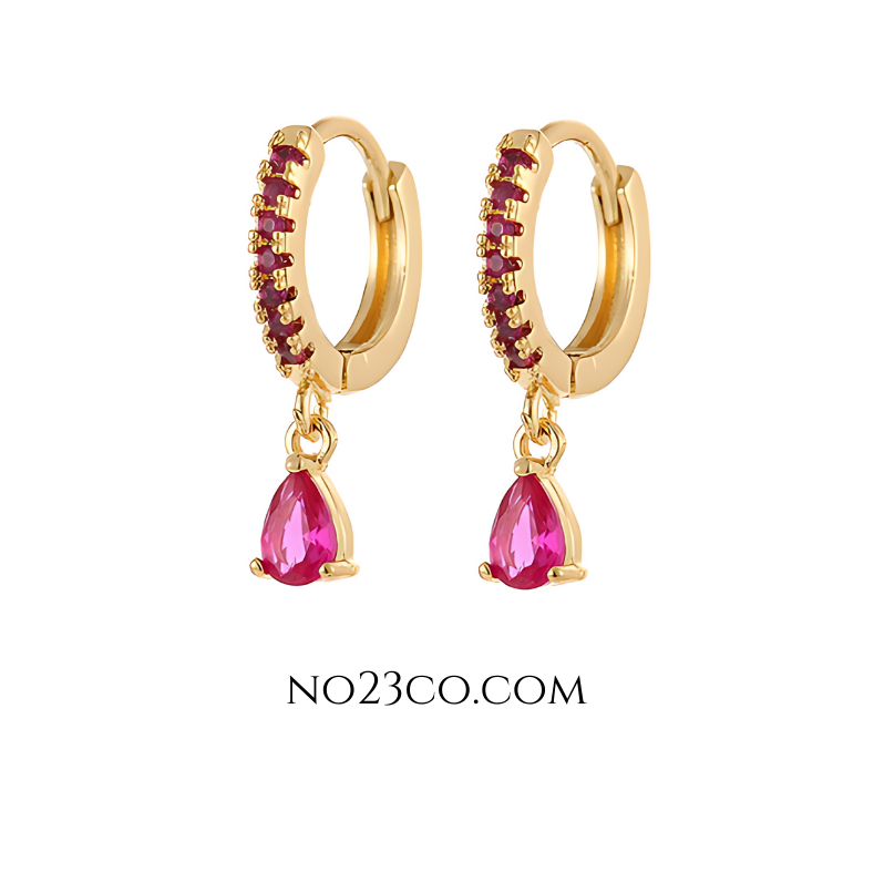 Bold magenta droplet earrings crafted in gold-filled stainless steel for a vibrant, modern look.