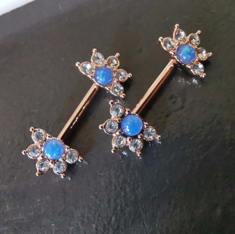 Mandala flower nipple bar piercing with blue stone and cubic zirconia, made from 14G gold surgical steel 316L