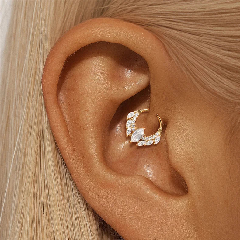 Lifestyle shot of model wearing the hypoallergenic 18 G CZ‑accented septum & daith ring