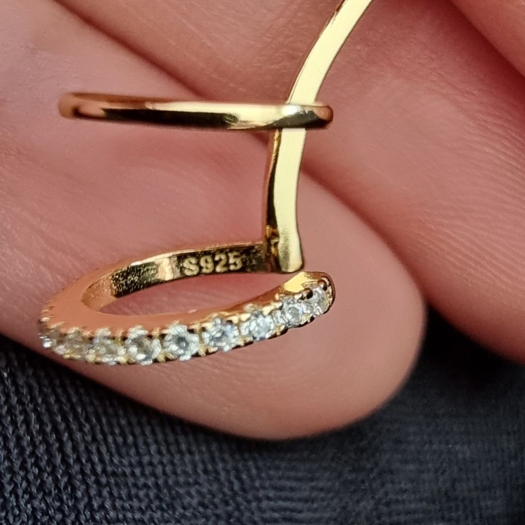 Elegant triple hoop ear cuff in 18K gold plated 925 sterling silver, combining sleek design and luxurious gold detailing for effortless, non-piercing style.