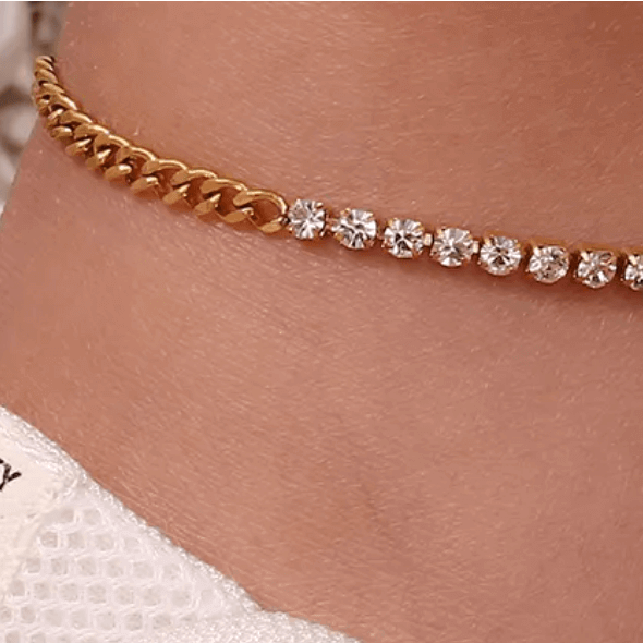 Elegant anklet bracelet crafted with white cubic zirconia, 18K gold-plated PVD stainless steel, and a tarnish-free finish—perfect for everyday wear or special occasions.