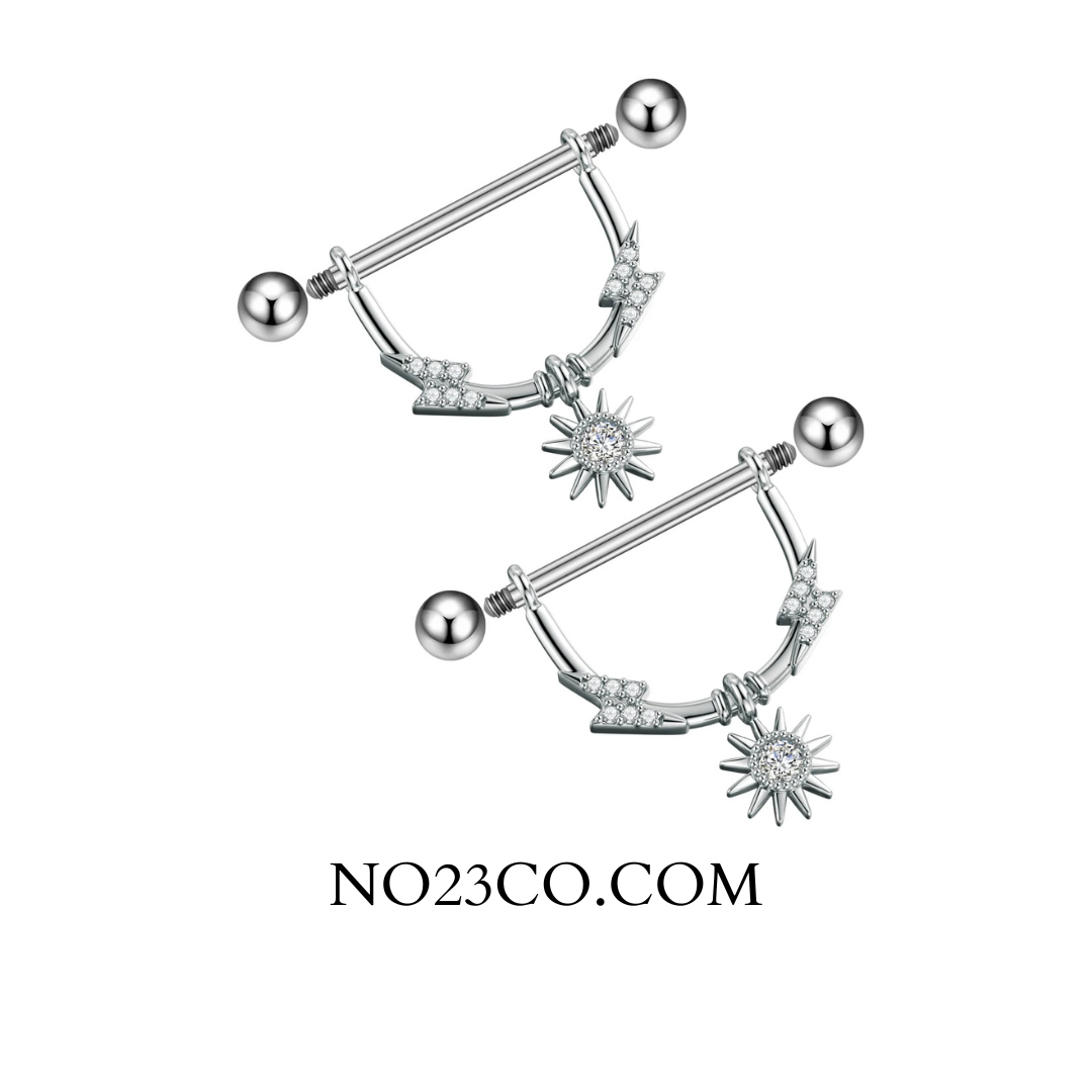 Styled display of star dangle nipple bars in stainless surgical steel — elegant, hypoallergenic body jewellery.