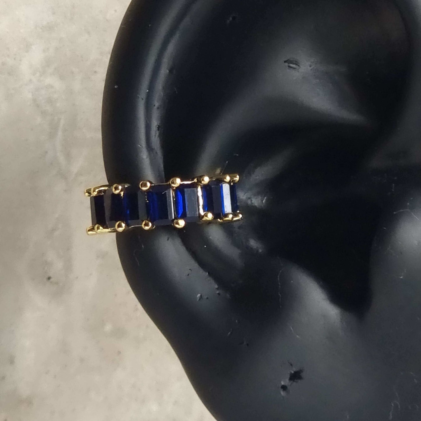 No piercing ear cuff blue gold on ear