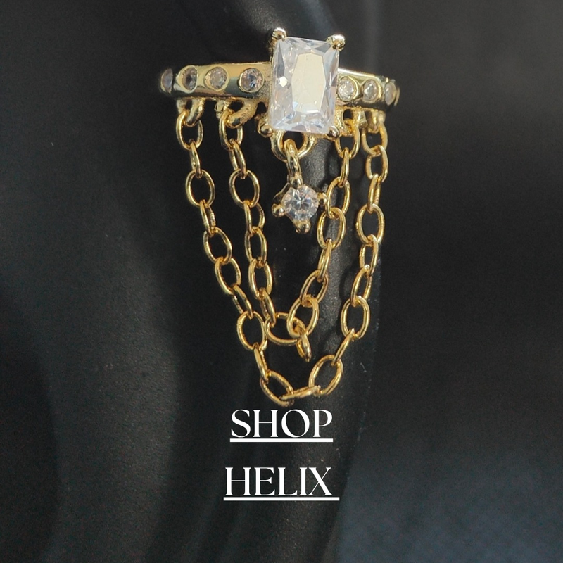 Discover our Helix Earring Collection, offering a range of stylish designs from delicate studs to bold hoops. Perfect for adding a touch of elegance to your ear curation, crafted with premium materials.