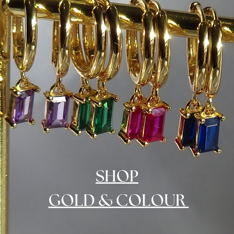 Explore our Gold & Color Collection, featuring vibrant jewelry in 18K gold plating with colorful gemstones, enamel, and unique designs.