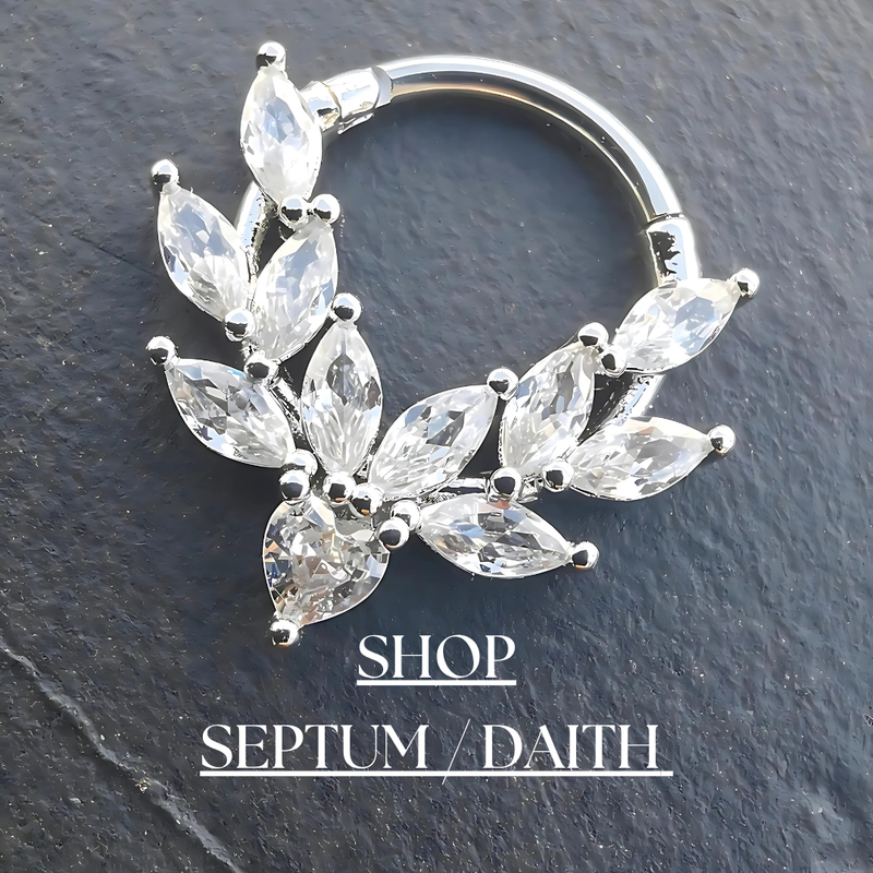 Explore our Septum and Daith Piercing Jewelry Collection, featuring elegant rings, clickers, and hoops in gold, silver, and stainless steel. Designed for comfort and style, our high-quality pieces add a bold and unique touch to your look.