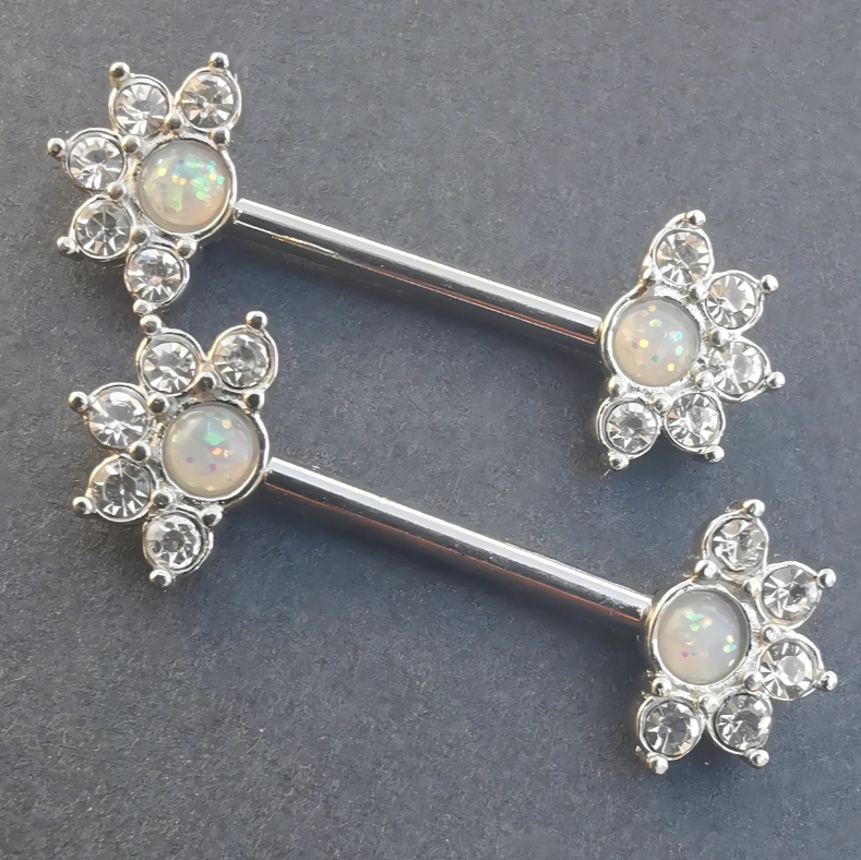 14 gauge 316L surgical steel nipple bar featuring a mandala flower end with a central white opal gemstone.
