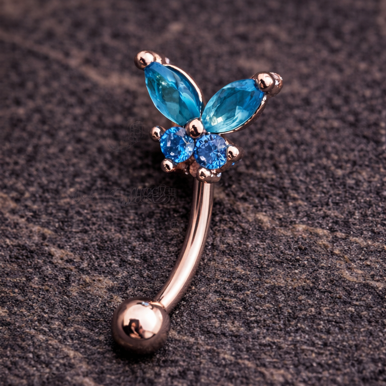 Butterfly-shaped eyebrow/rook bar with blue gemstones on a dark textured background