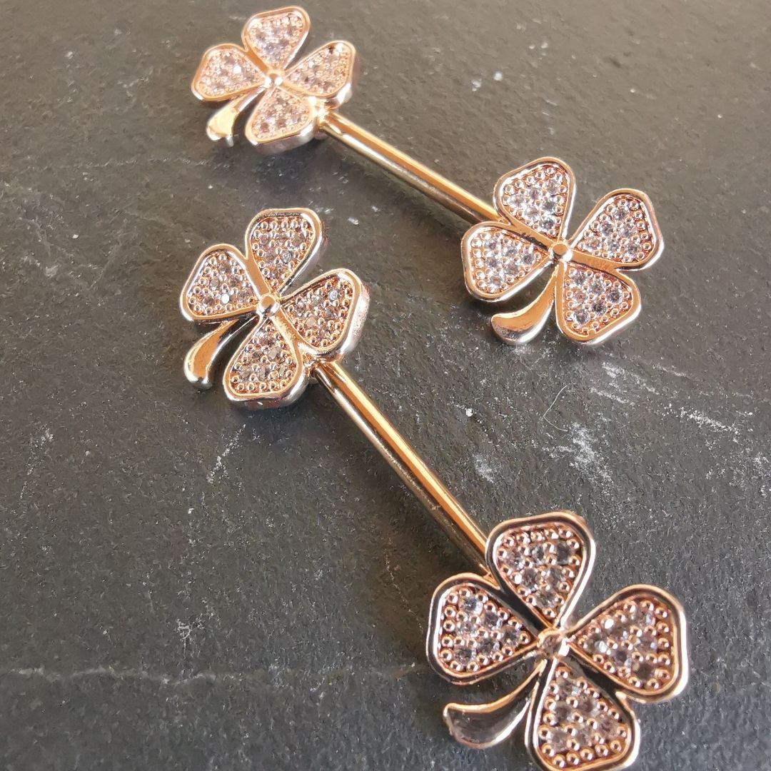 14G surgical steel clover leaf nipple bar in rose gold with dazzling CZ gemstones