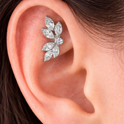 Close-up of an ear with a diamond earring