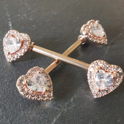 Heart nipple bar jewelry in rose gold with cubic zirconia, crafted from durable 14G surgical steel 316L.