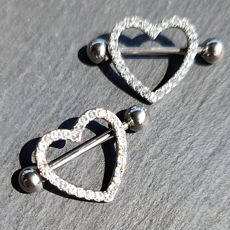 316L surgical steel barbell for nipple piercing (14G) with a sleek heart shield design in high-polish silver.
