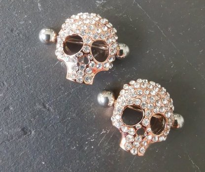 Luxurious Rose Gold Skull Nipple Barbell – 16G Surgical Steel with Brilliant White Zirconia Stones – A stunning blend of edgy and glamorous design.