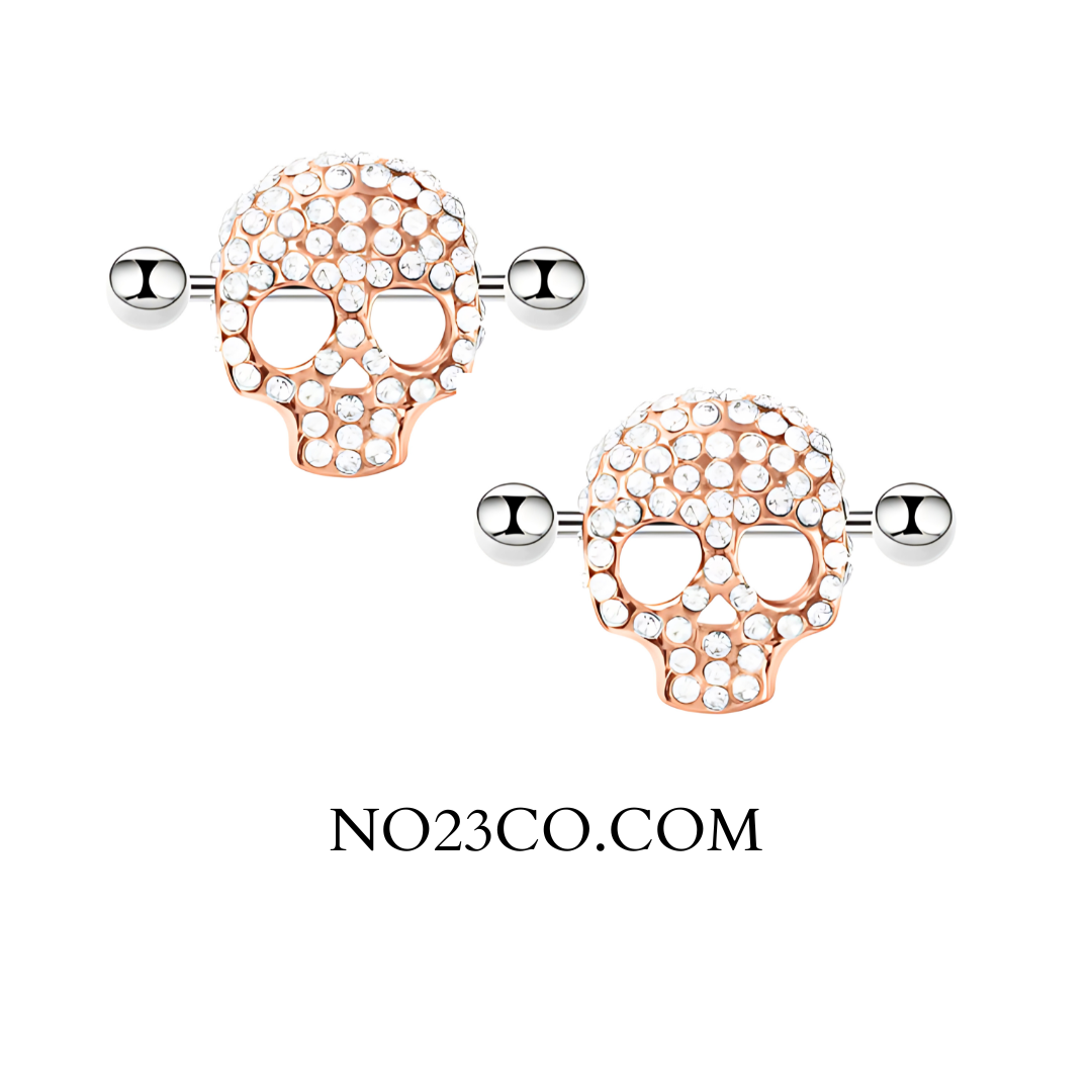 Rose Gold Skull Nipple Barbell Piercing – 16G Surgical Steel with White Zirconia Sparkle – A bold and stylish body jewelry piece with a Gothic edge and shimmering accents.