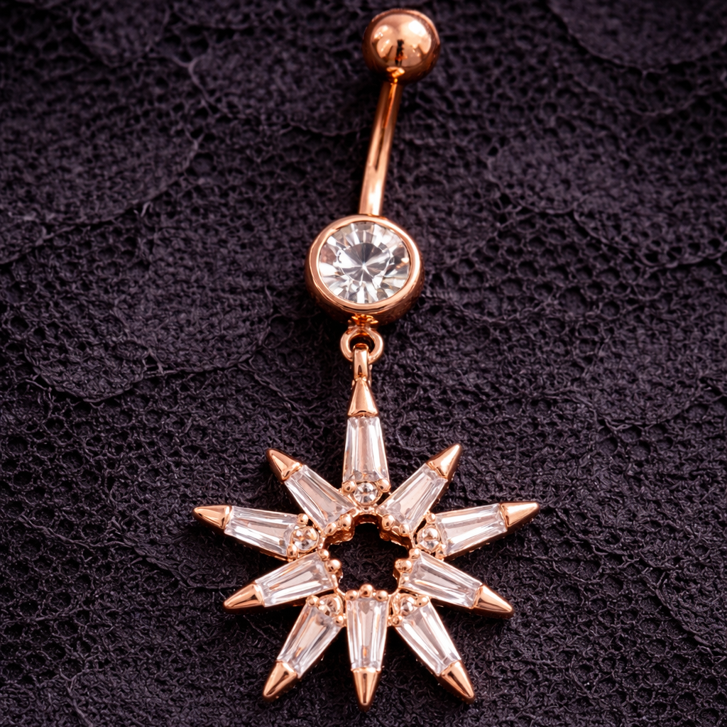 Rose gold belly button ring with star-shaped pendant on a dark textured background