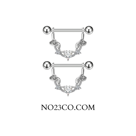 Shield dangle nipple piercing bar in 14G surgical steel with rose motif and clear cubic zirconia accents.